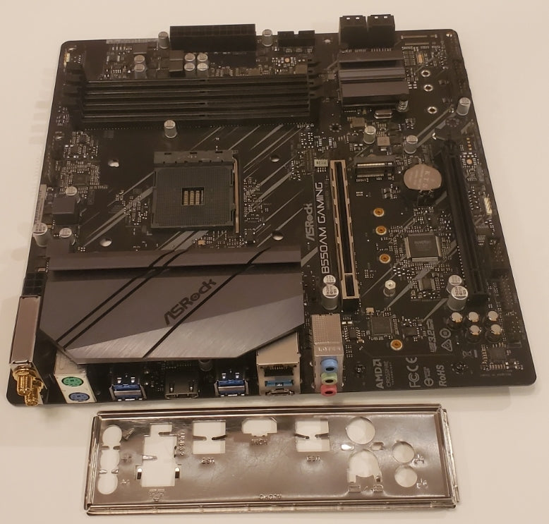 ASRock B550AM Gaming Motherboard (Broken PCIE Express Slot Clip)